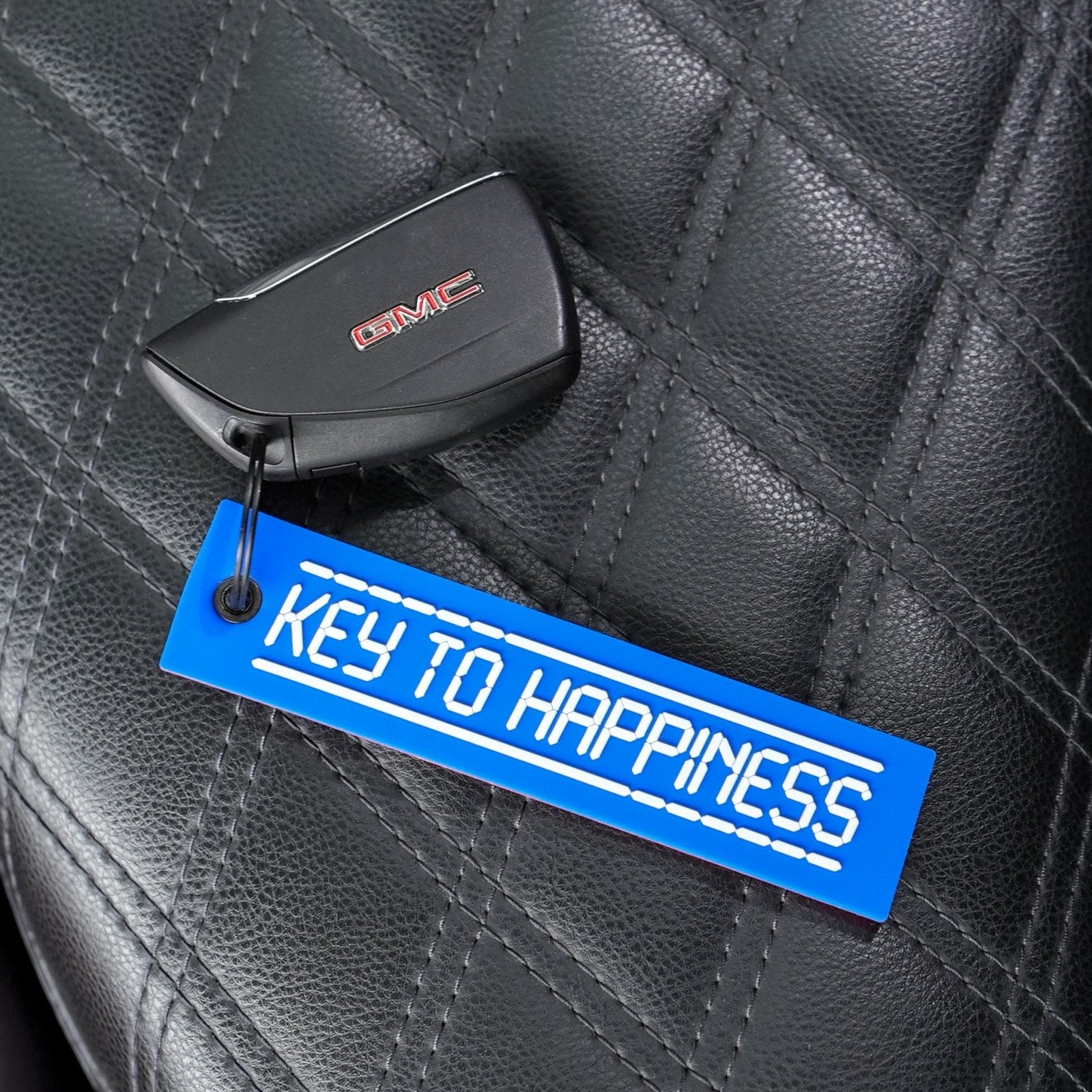 Red/Blue Key to Happiness Rubber Jet Tag