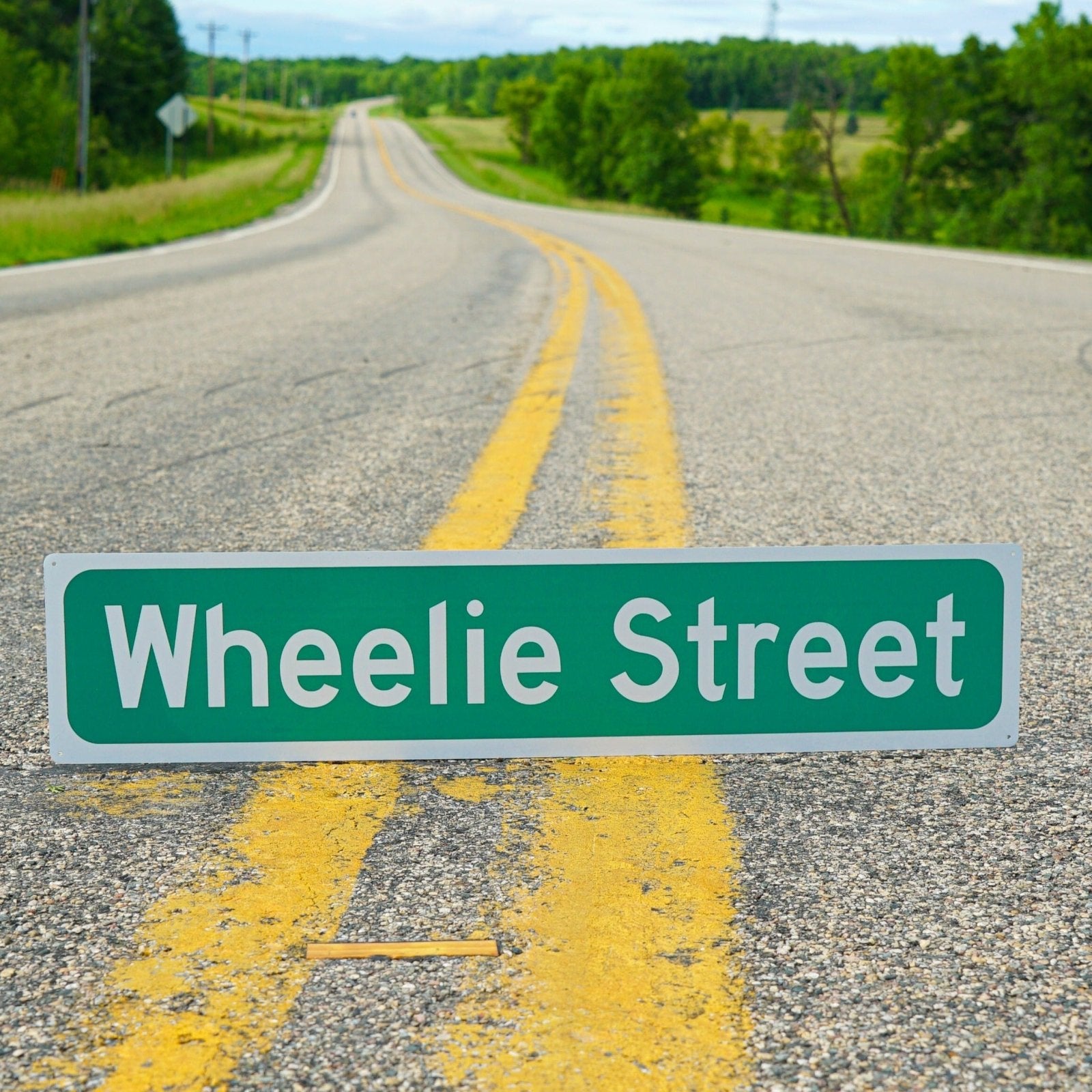 Wheelie Street Sign